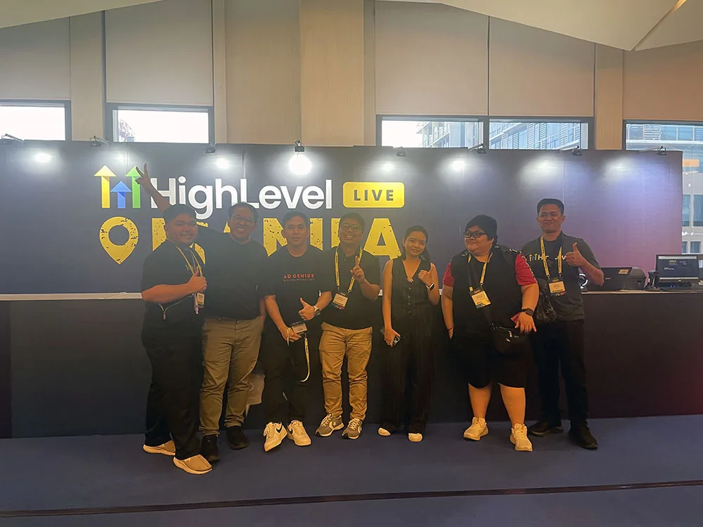 Group of attendees in front of the HighLevel LIVE Manila backdrop
