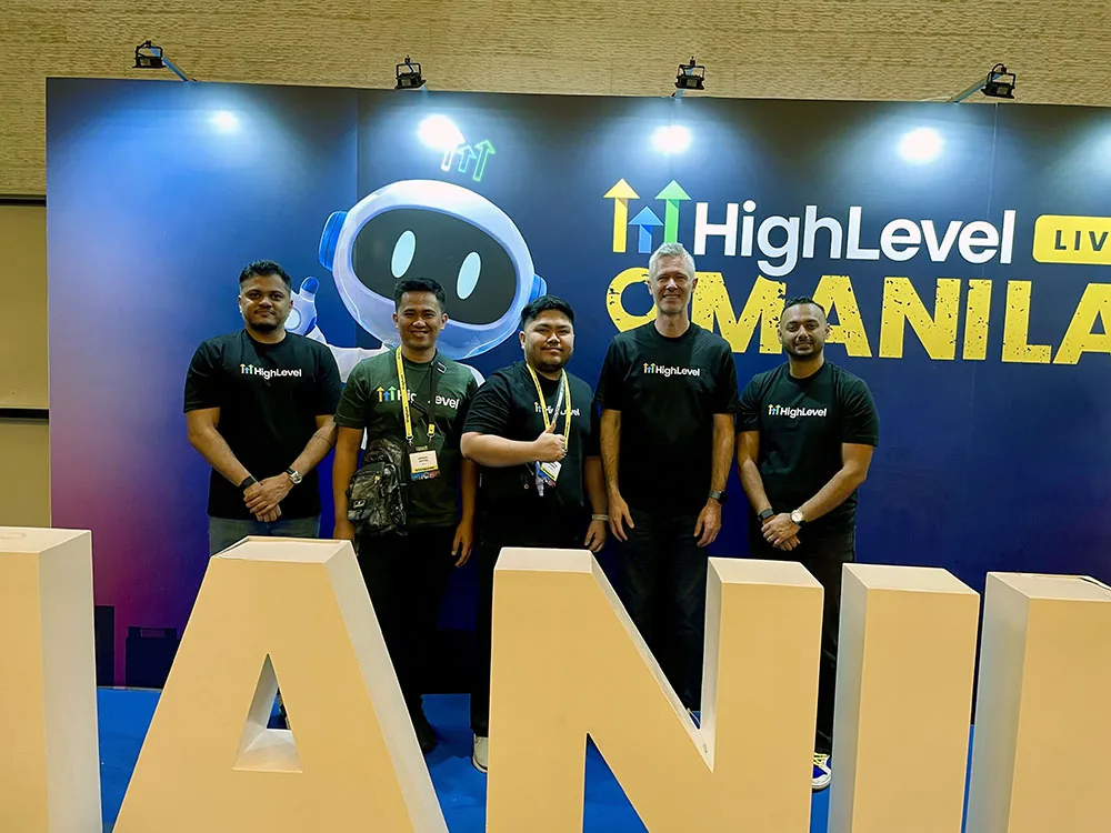 Lemuel Duyag with members of the HighLevel team at HighLevel LIVE Manila